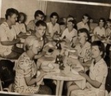Guests around a table at The Coop in the 1960s